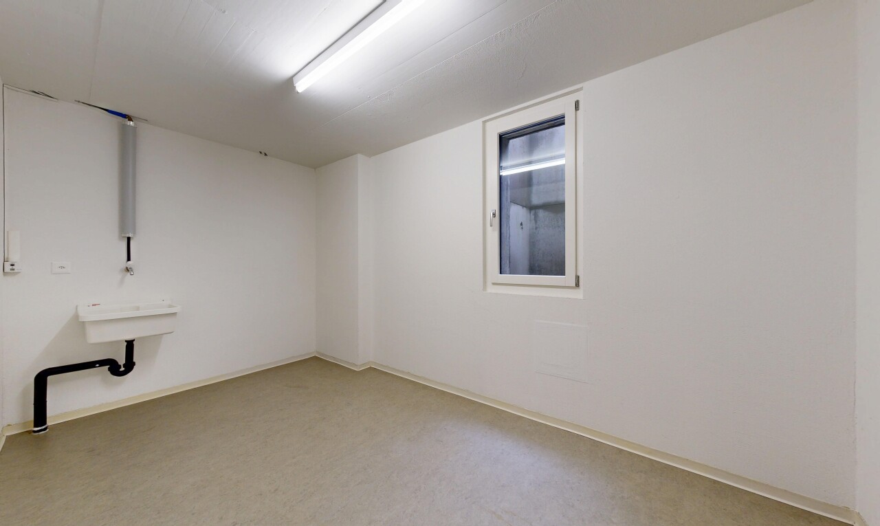 empty room with carpet and baseboards