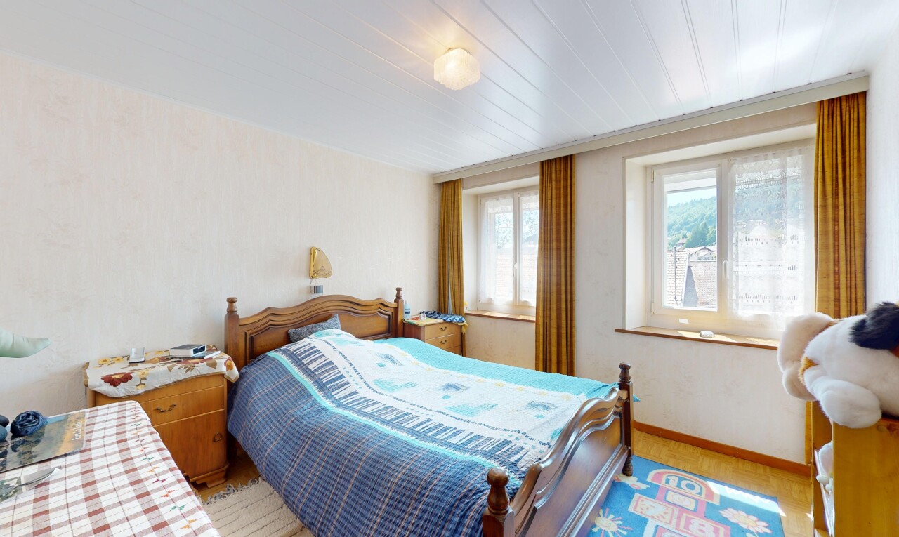room / bedroom featuring light wood-type flooring and baseboards