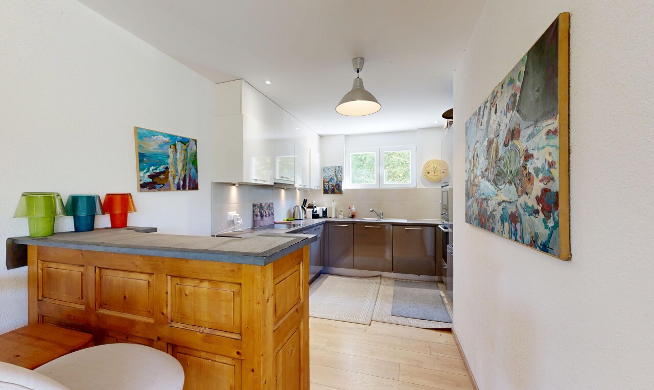 two tone kitchen featuring a peninsula, recessed lighting, dishwasher, light wood finished floors, and two tone cabinets