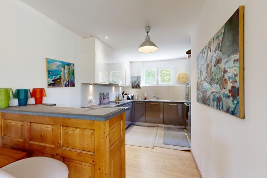 two tone kitchen featuring a peninsula, recessed lighting, dishwasher, light wood finished floors, and two tone cabinets