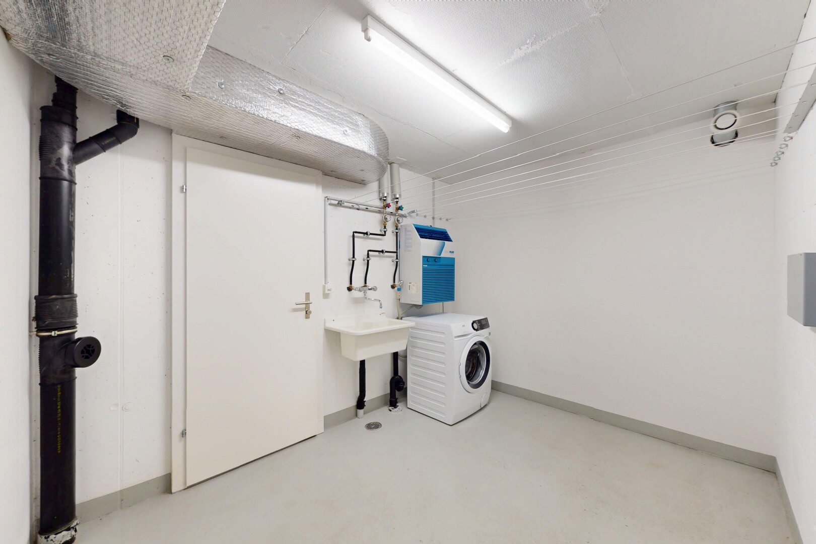 buanderie avec sous-sol, buanderie, inside property, drywall, et cloison sèche