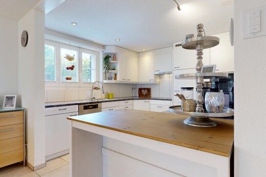 küche mit butcher block countertops, arbeitsfläche, dark countertops, two types countertops, und light floor