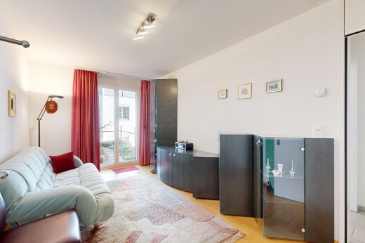 salon avec inside property, cloison sèche, drywall, lumière naturelle, et natural light
