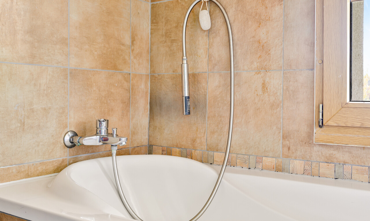 bathroom with a bath