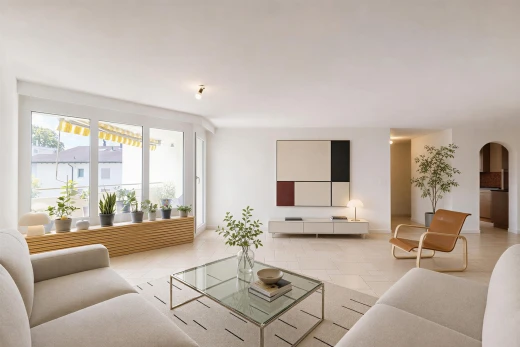salon avec passages en arc, drywall, cloison sèche, light floor, et inside property