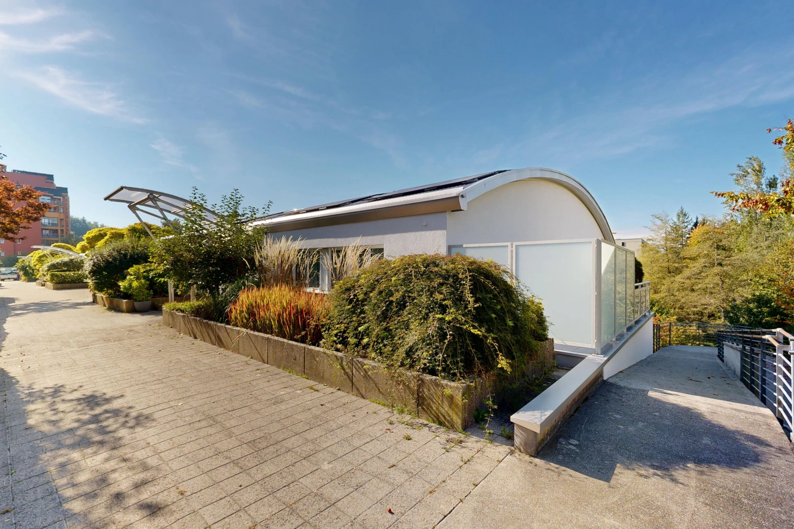 view of home with roof mounted solar panels