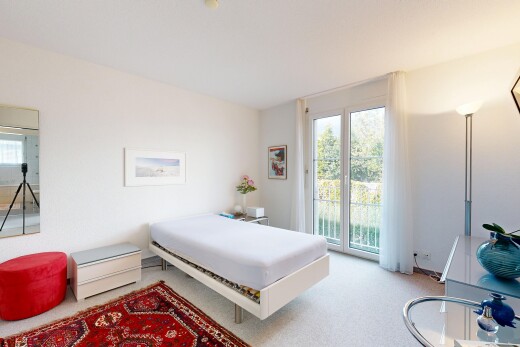 zimmer / schlafzimmer mit gipskartonwand, drywall, teppich, carpet, und inside property