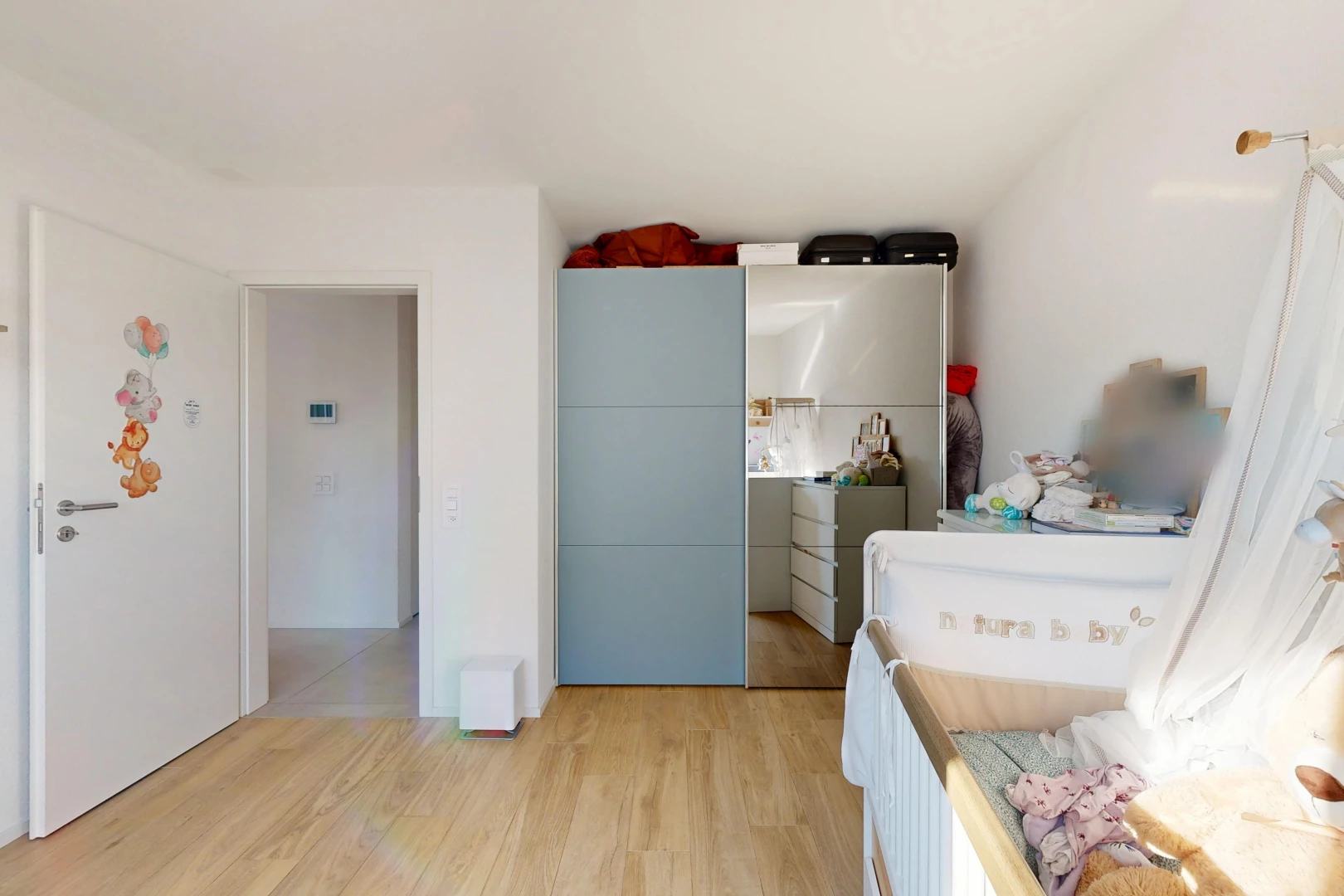 room / bedroom with light wood-type flooring
