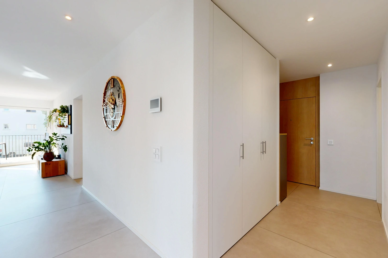 hall with recessed lighting