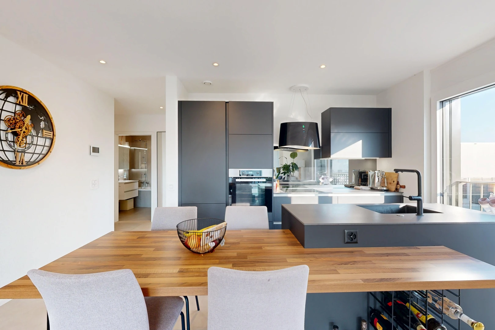 dining room with a sink and recessed lighting