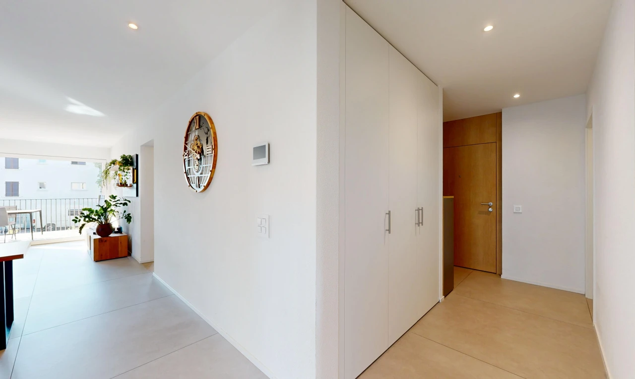hall with recessed lighting