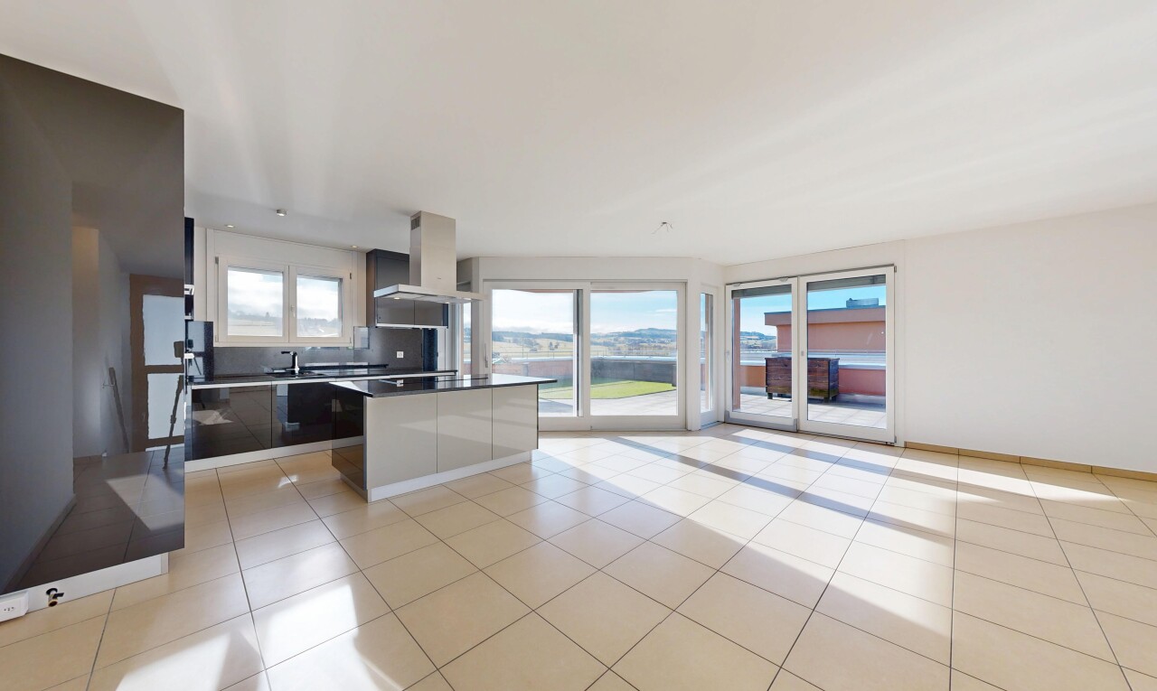 cuisine avec inside property, light floor, hotte, cloison sèche, et drywall