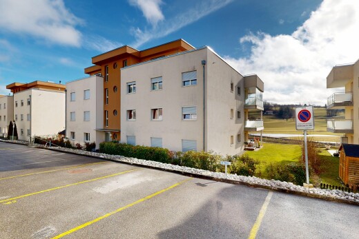 extérieur du bâtiment avec day time, vue sur le complexe d'appartements, apartment complex view, et parking