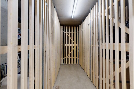 hall with concrete flooring