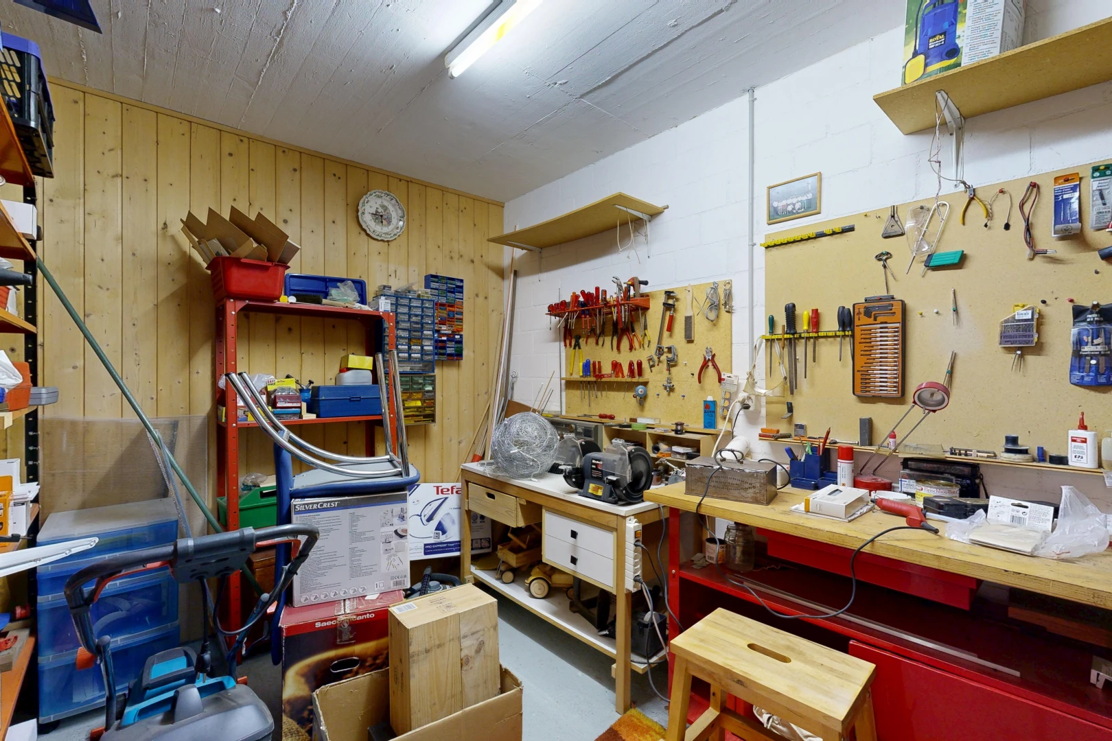 storage room with a workshop area
