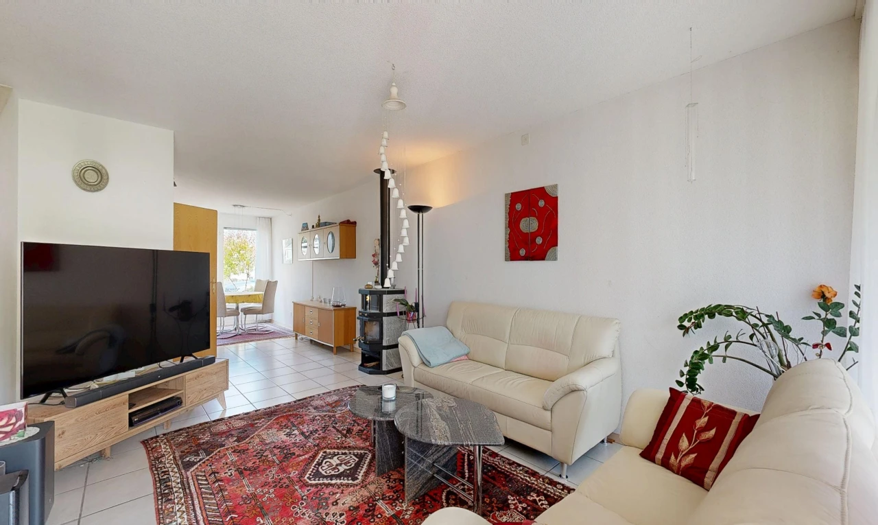 living room with light tile patterned floors