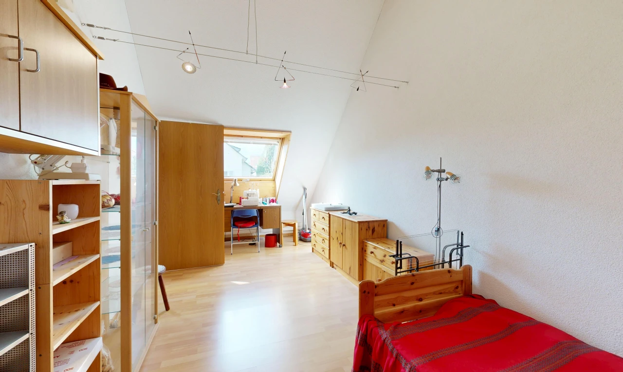 room featuring a high ceiling and light wood-type flooring