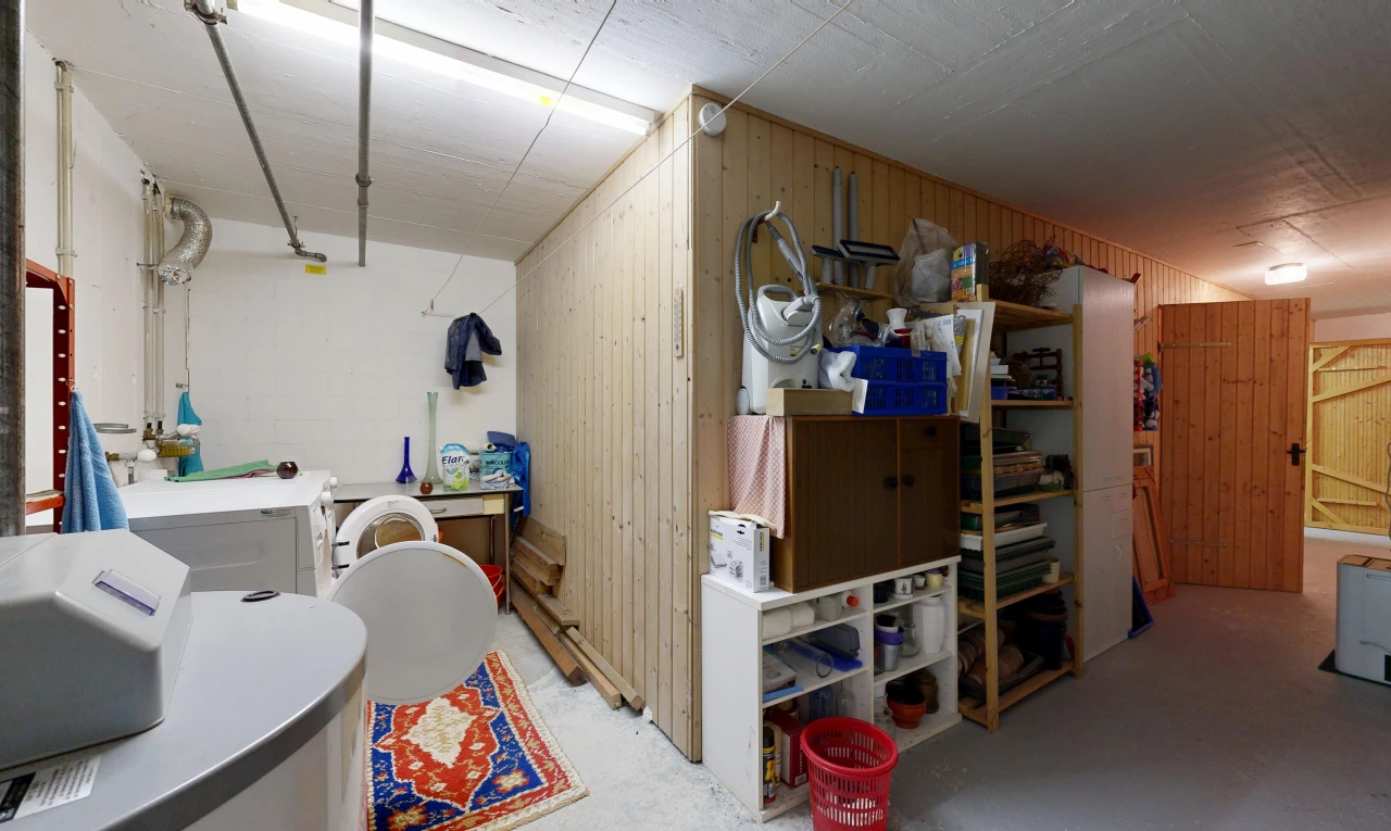 storage / pantry featuring washer / clothes dryer