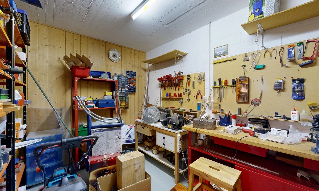 storage room with a workshop area