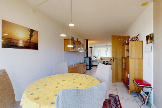 dining area featuring pendant lighting and light tile patterned floors