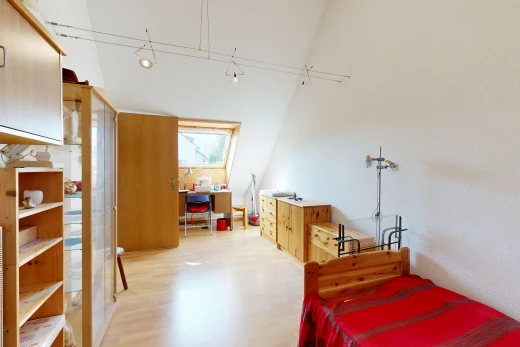 room featuring a high ceiling and light wood-type flooring