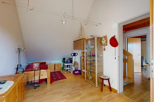 living room featuring light wood-style floors and vaulted ceiling