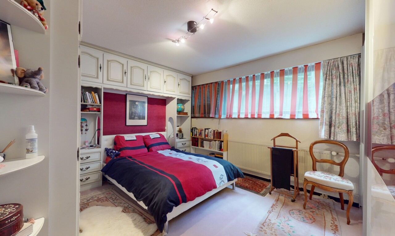 room / bedroom featuring radiator