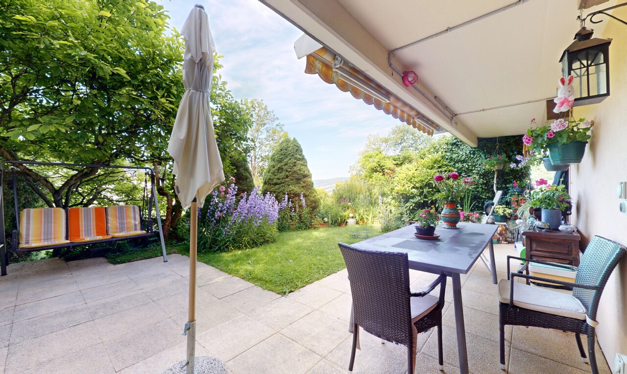 terrace with a patio and outdoor dining area