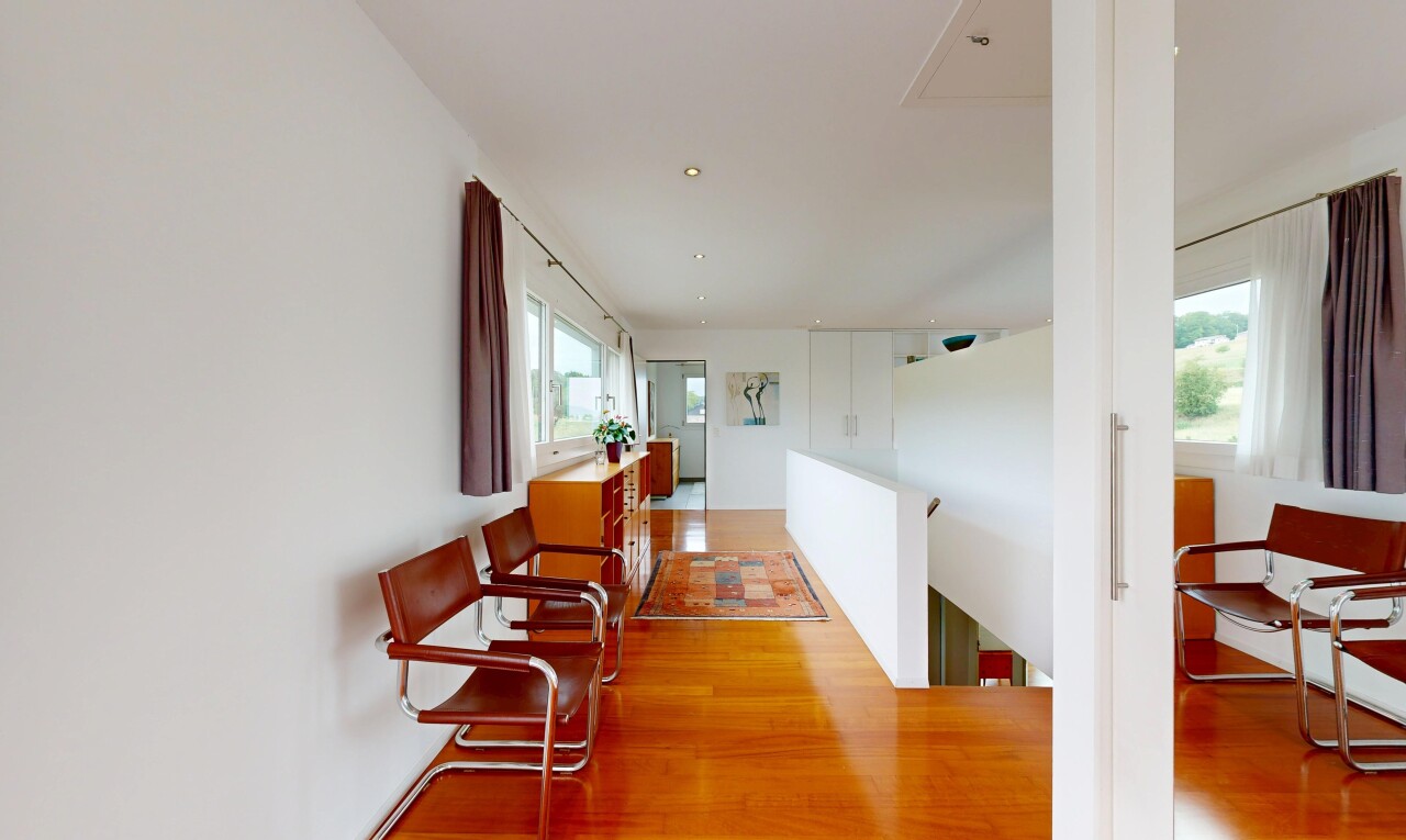 halle / korridor mit inside property, gipskartonwand, drywall, holzfußboden, und wood finish floor