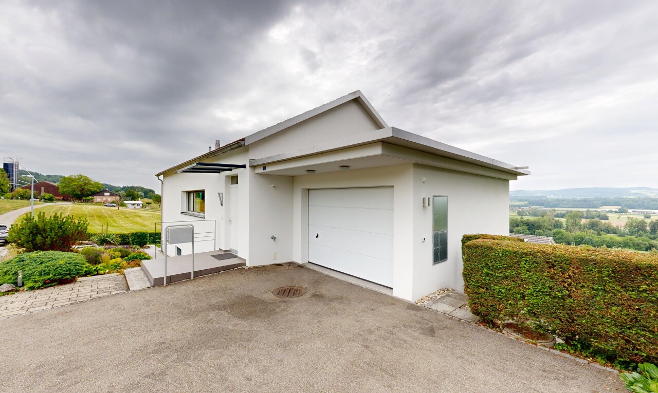 außenansicht mit overcast, from property, stuckverkleidung, auffahrt, und garage angeschlossen