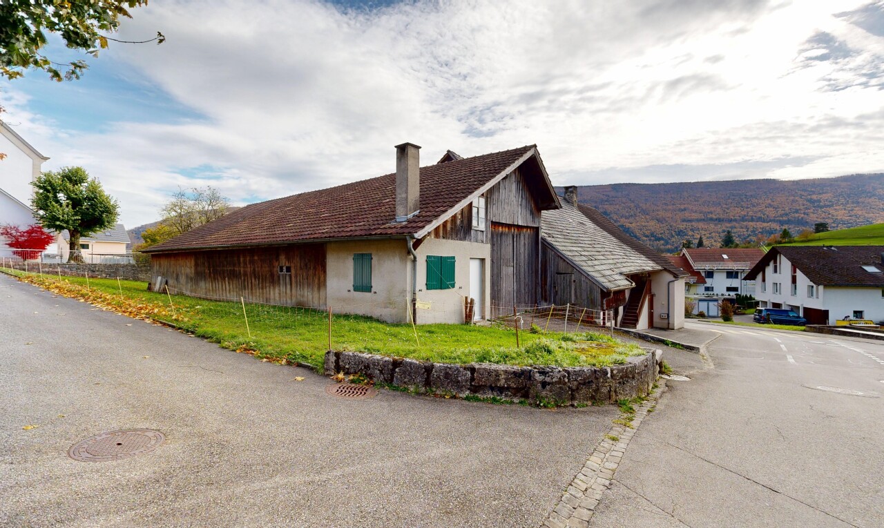 außenansicht mit schornstein, property visible, vertikale verkleidung, und day time