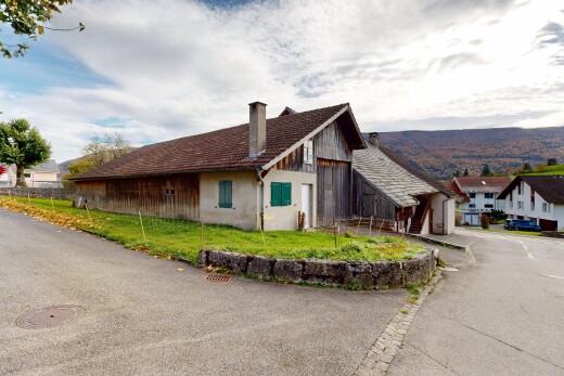 außenansicht mit schornstein, property visible, vertikale verkleidung, und day time