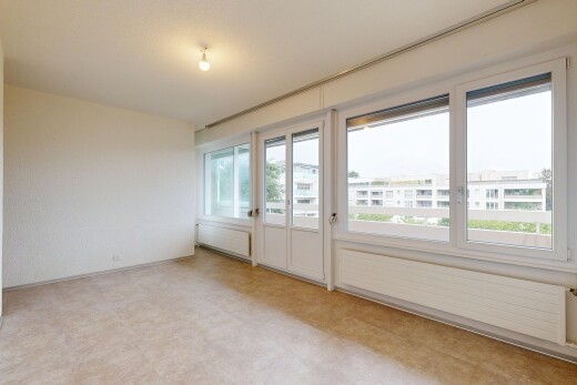 unfurnished room featuring light floors