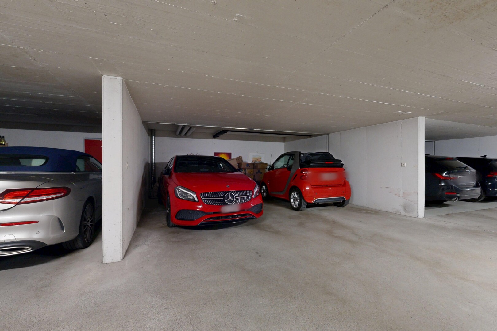 view of parking featuring a parking deck