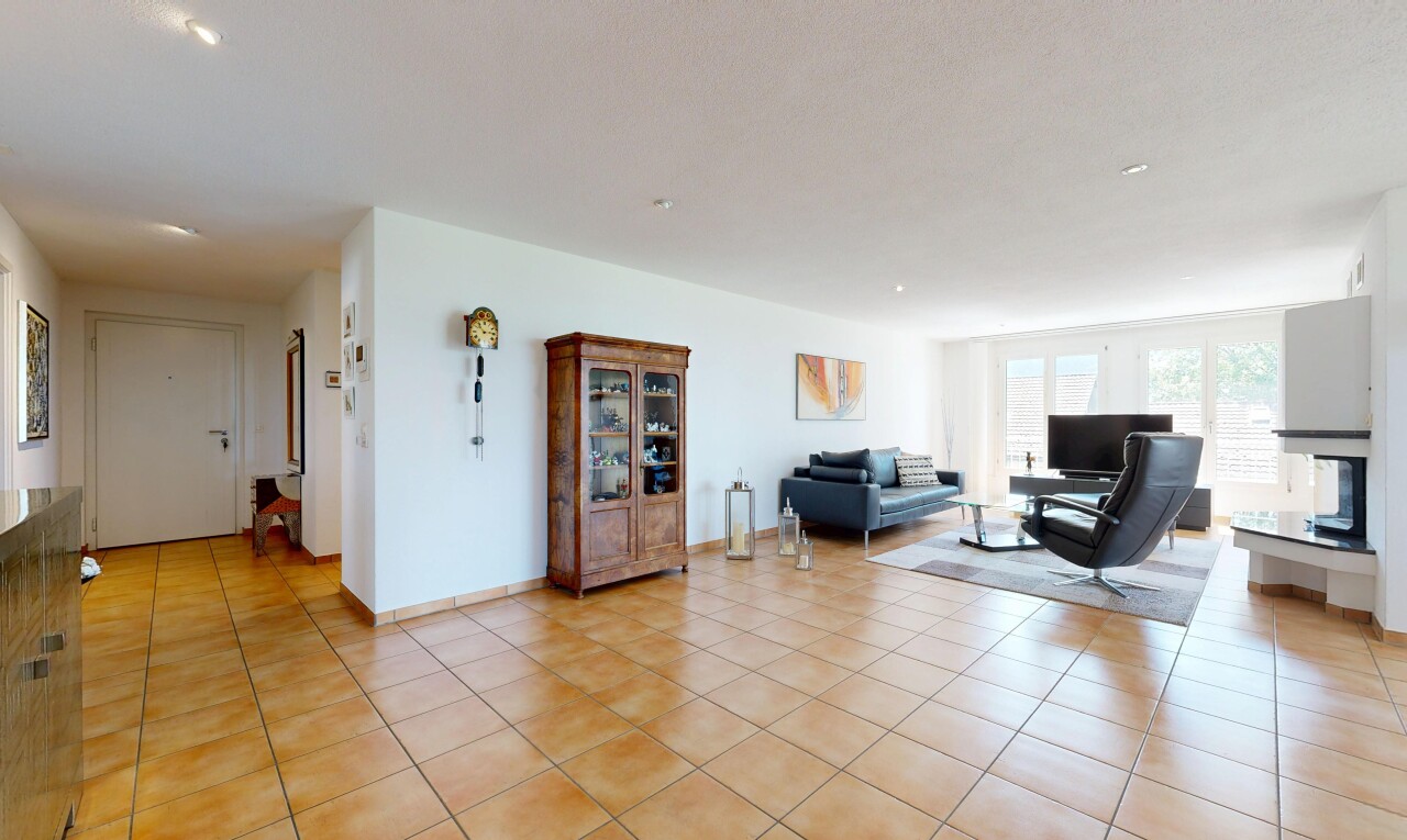 living room with light tile patterned floors