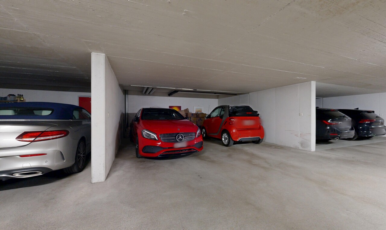 view of parking featuring a parking deck