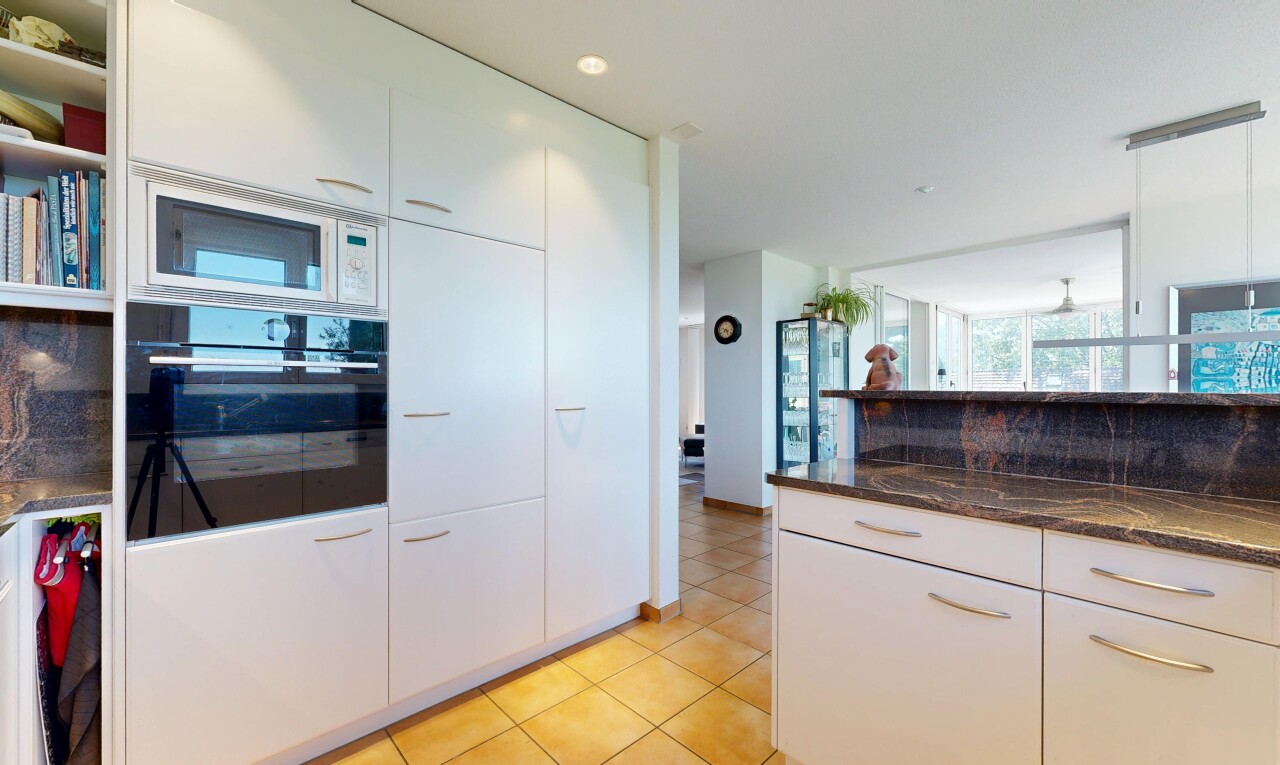 kitchen featuring oven, white cabinets, dark stone counters, white microwave, and light tile patterned floors