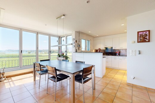 dining area with light tile patterned floors