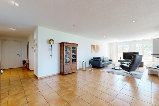 living room with light tile patterned floors