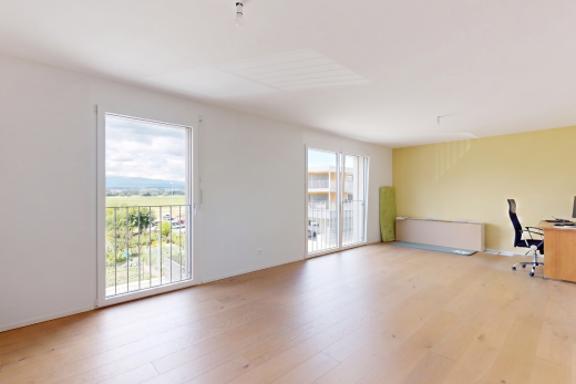 pièce vide avec espace bureau, inside property, drywall, cloison sèche, et wood finish floor