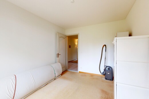 chambre avec carpet, moquette, inside property, drywall, et cloison sèche