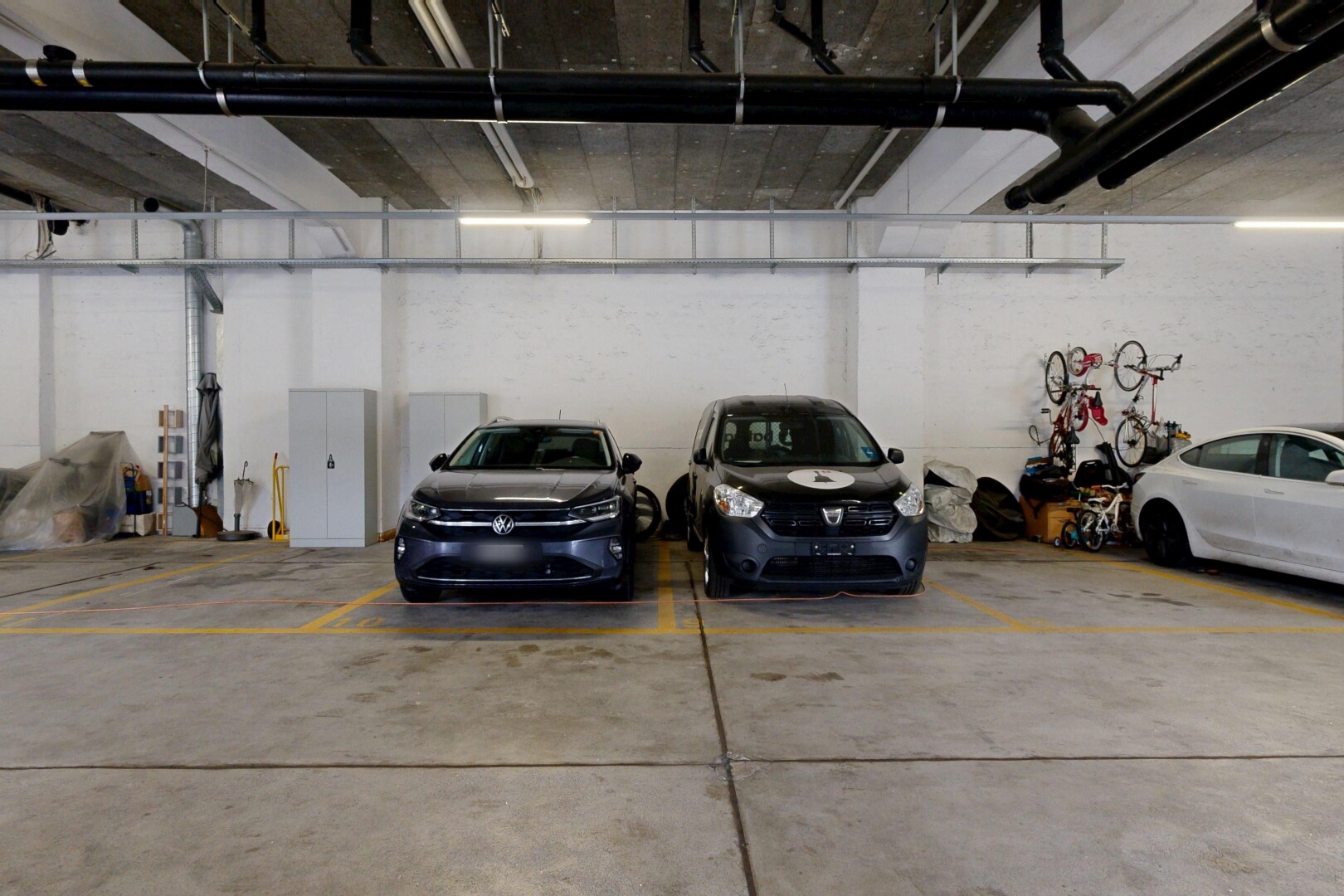 view of parking featuring a parking deck