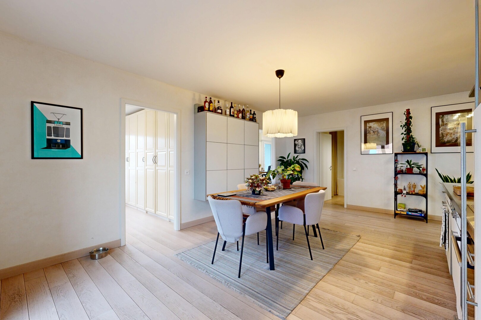 dining room with light wood-type flooring and baseboards