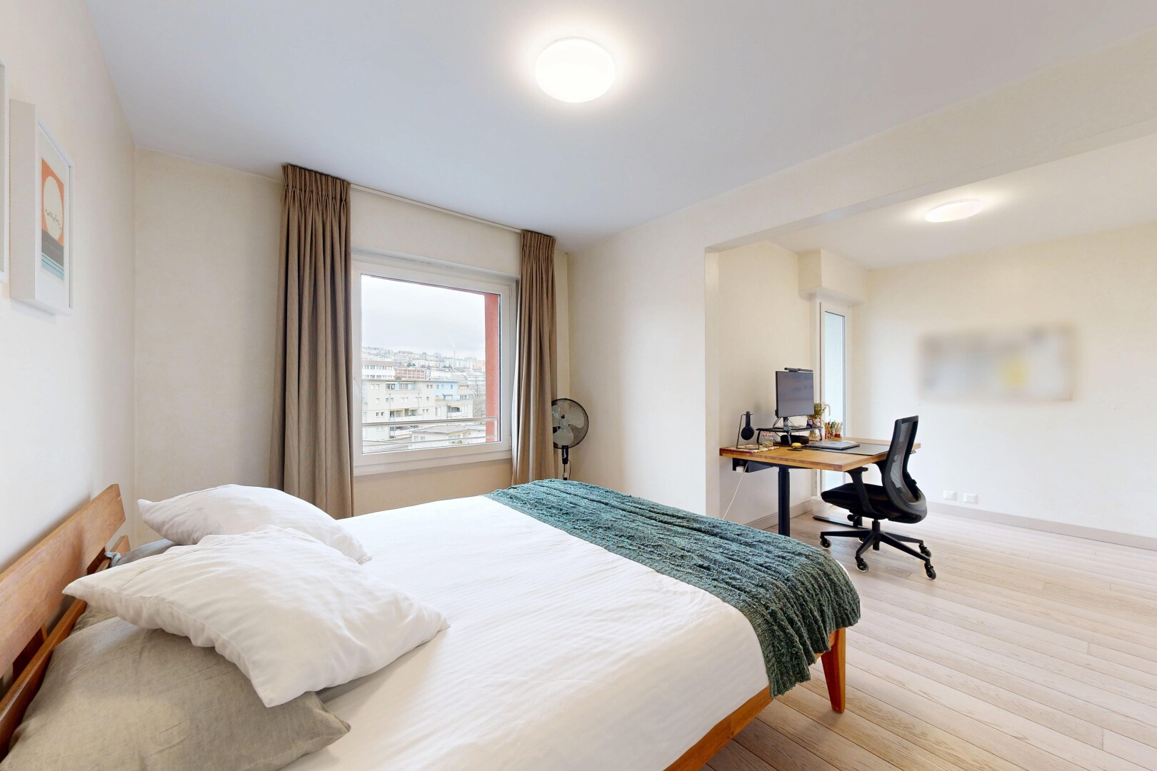 room / bedroom with a desk and wood finished floors