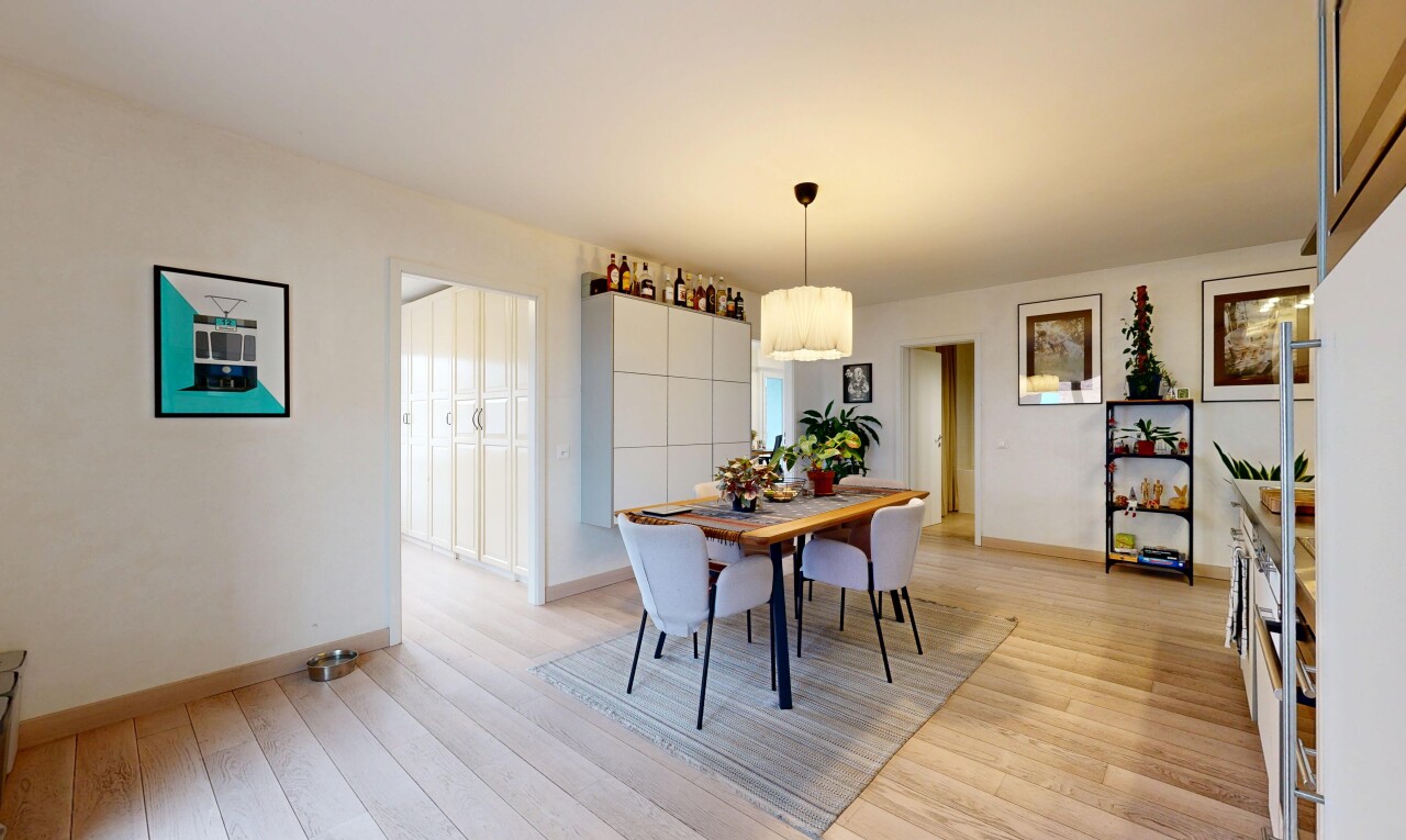 dining room with light wood-type flooring and baseboards
