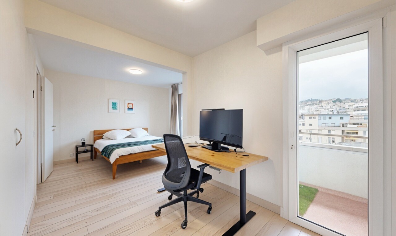 home office featuring light wood finished floors and baseboards