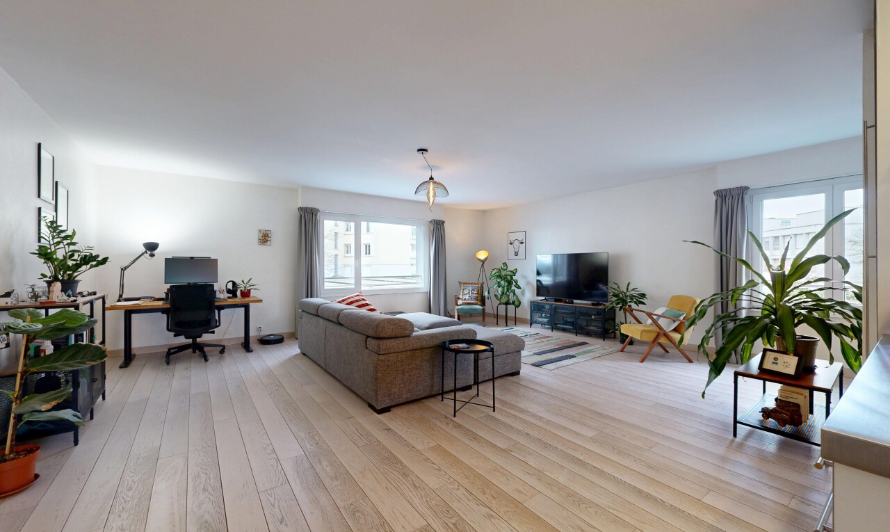 living area with an office area and light wood-style floors