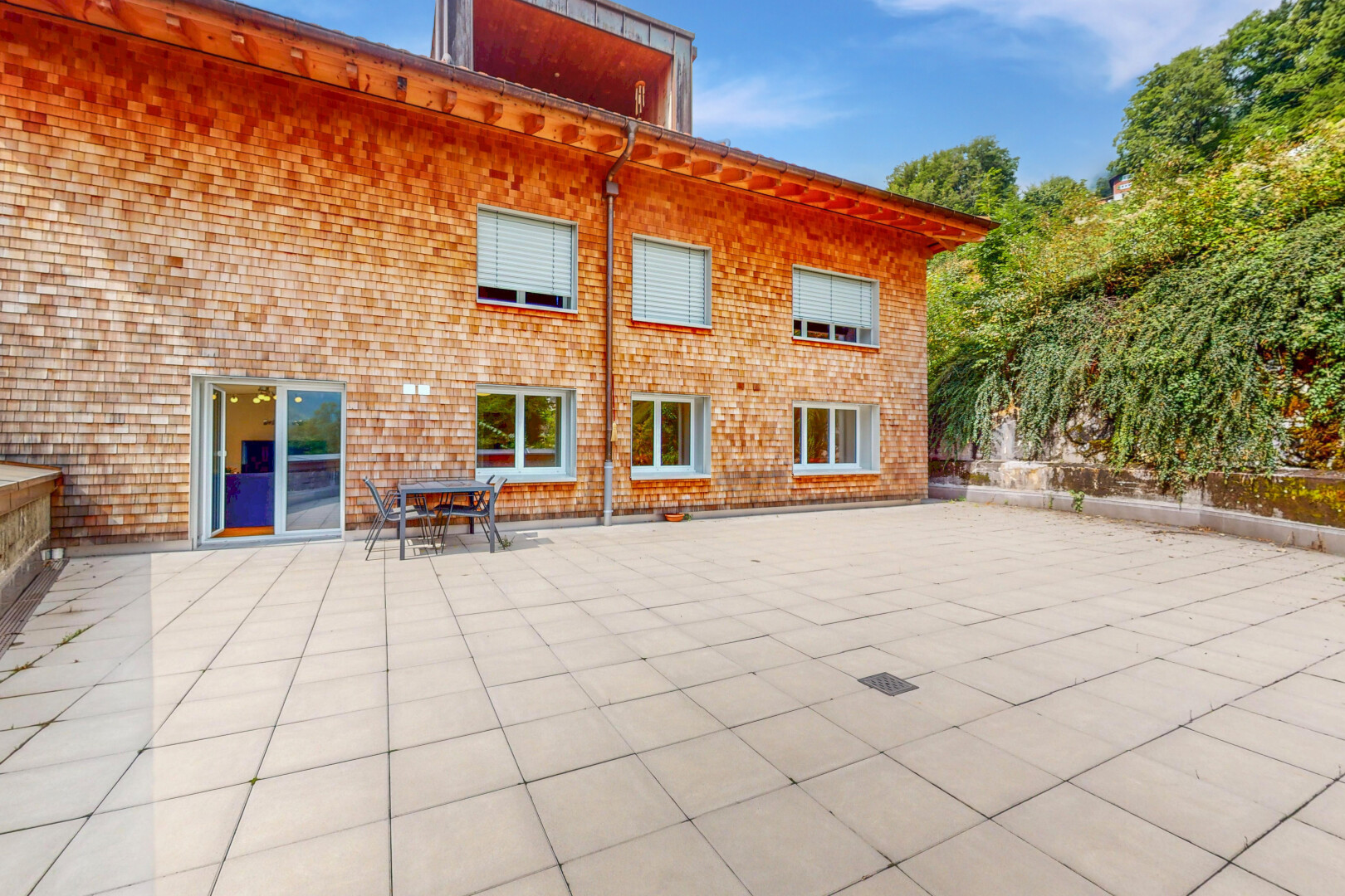 außenansicht mit property visible, day time, terrasse, und schindelverkleidung