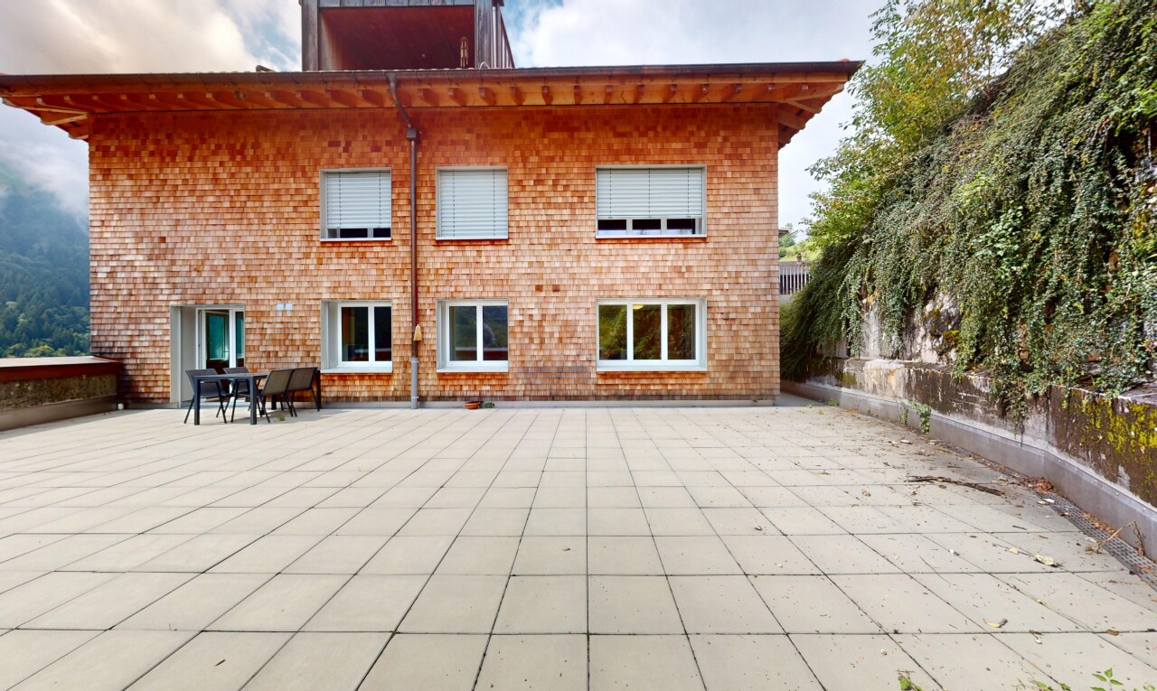 außenansicht mit terrasse, property visible, und ziegelverkleidung