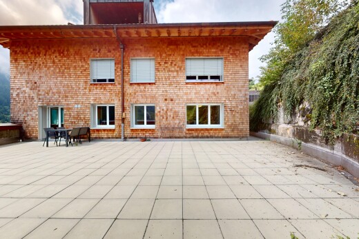 außenansicht mit terrasse, property visible, und ziegelverkleidung